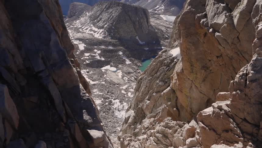 View looking down between two mountains