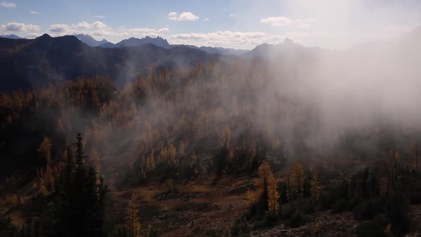 A cloud drifts close to the ground