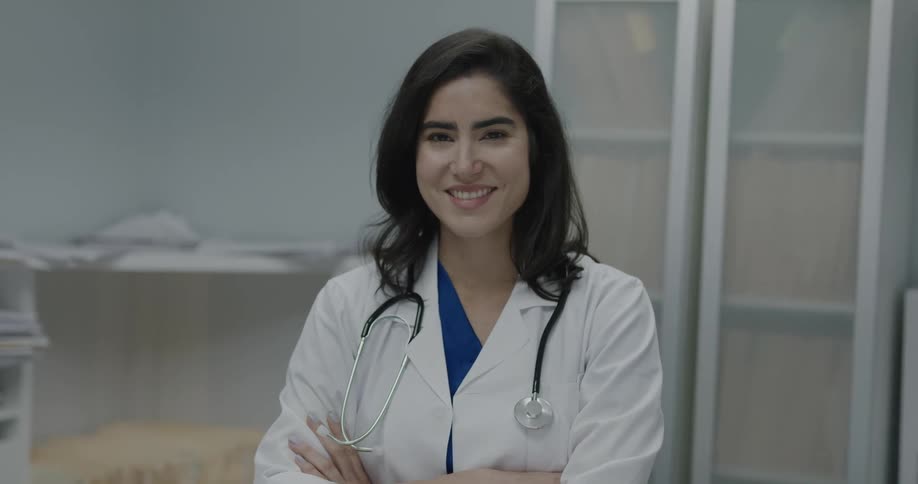 The doctor wears her stethoscope