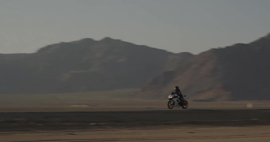 A motorbike driving on a highway