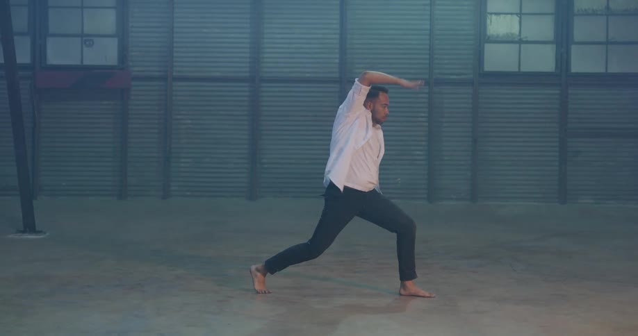 A man dances in place