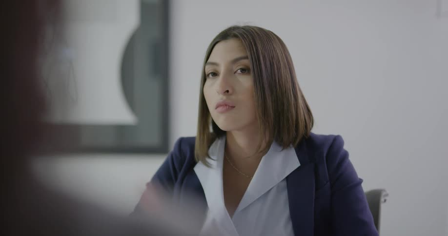 A woman speaking to an unknown person