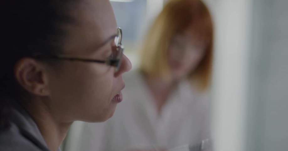 Two women speaking to each other