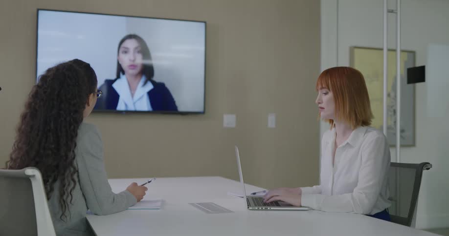 Women on video conference in the office