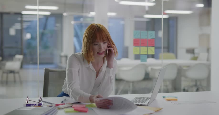 A woman talking on a phone