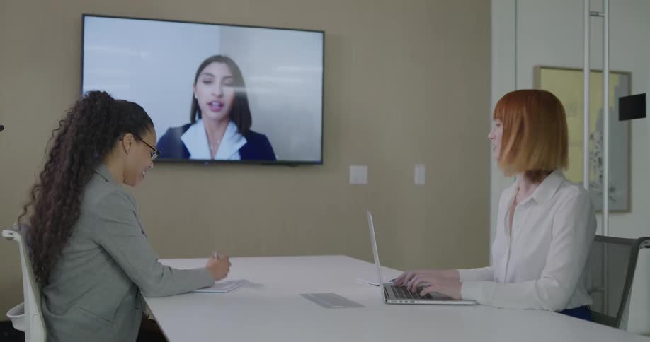 Businesswomen make a video conference in the office