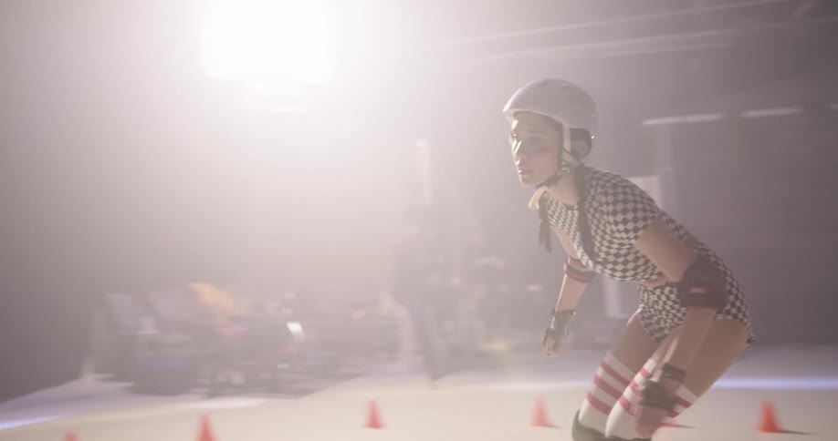 Women racing one another on roller skates