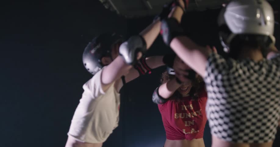 A group of women high fiving