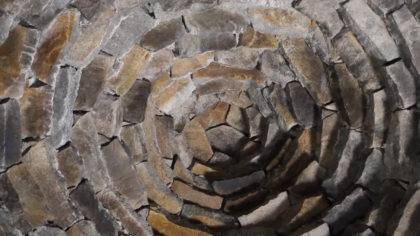Stones are arranged in a circular pattern