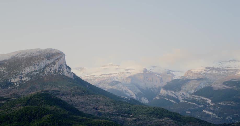 Snow covered mountain peaks in the wilderness