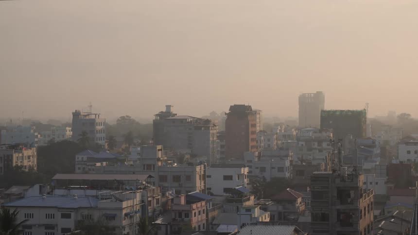 A run down city on a foggy day