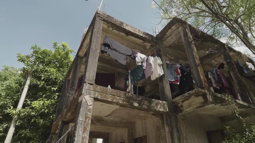 Clothes hang around the building