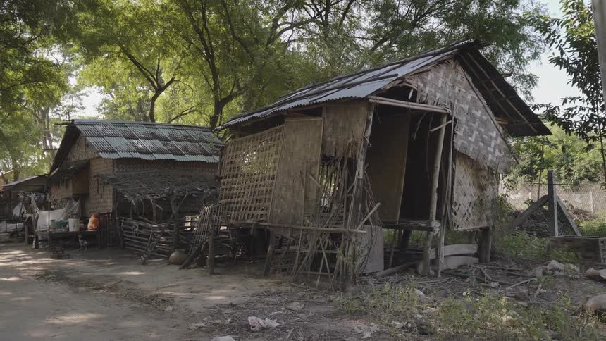 An old building is crooked on its foundation