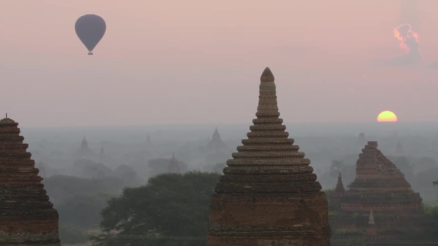 A hot air balloon flies over a sanctuary