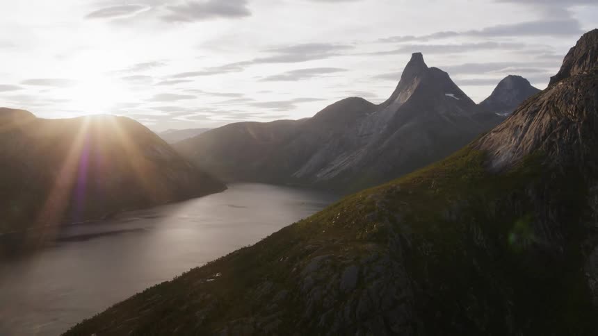 Mountains rise over a lake