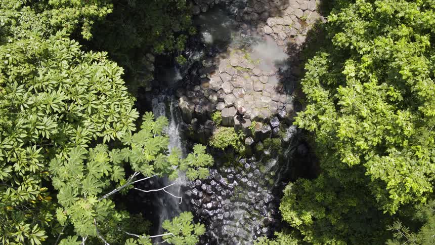 Birds eye view of a water fall and stream