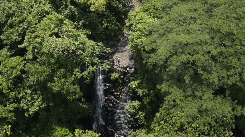 Aerial shot of waterfall in a El Salvador