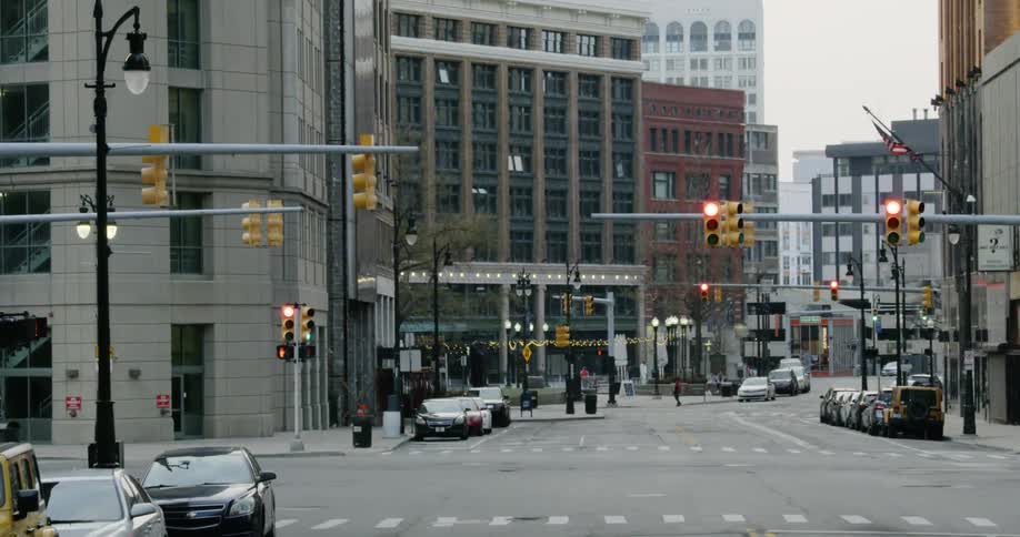 Cars line a deserted downtown street