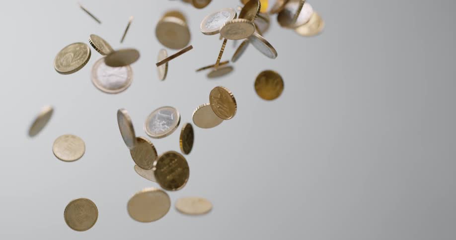 A pile of coins flies up into the air and then falls back down