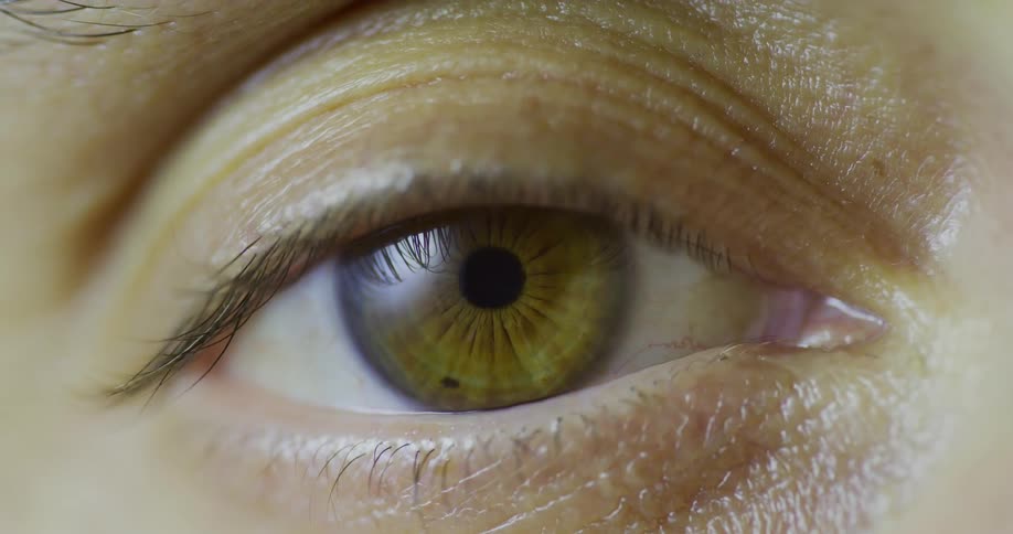 Woman closes and then opens her eye