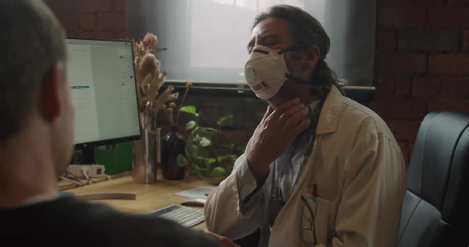 The doctor talks to the patient