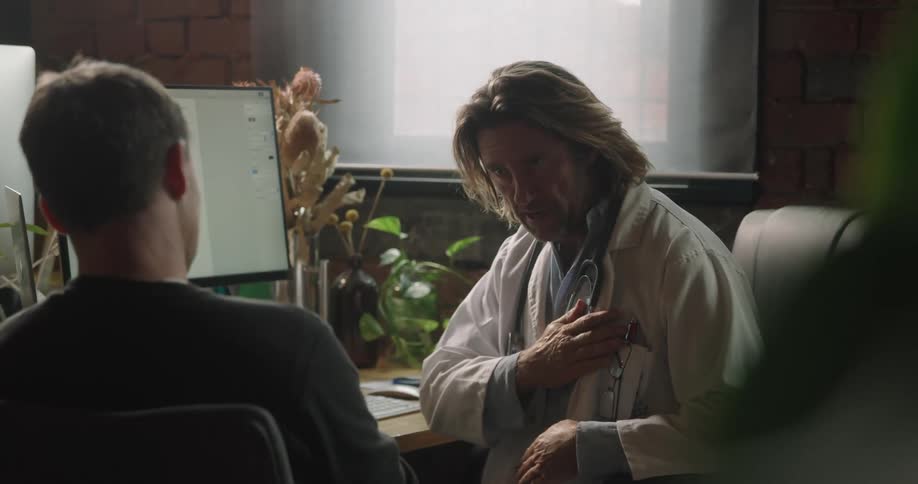The doctor explains to his patient