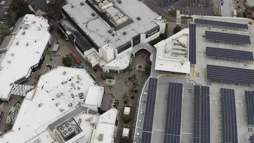 Several large buildings close together are shown from above