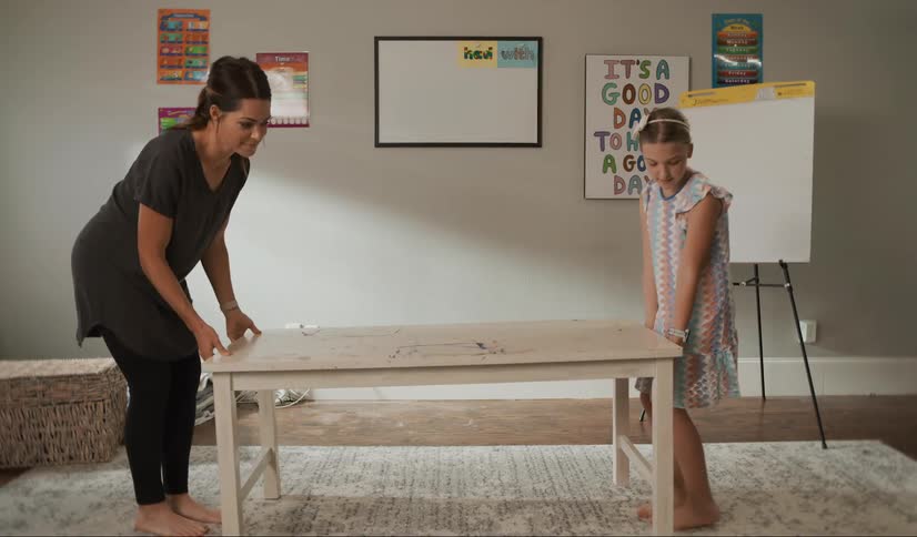 Mother and daughter create impromptu school room in home