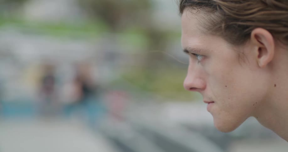 A person looks around outdoors