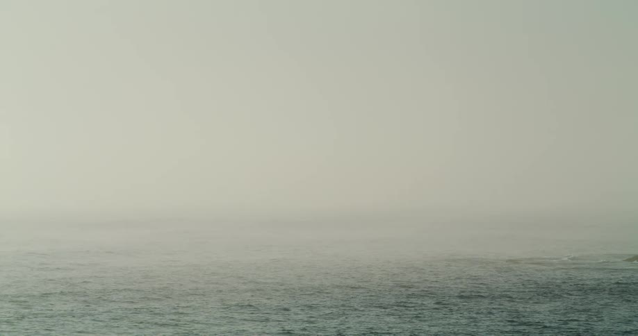 Ocean with fog covering it