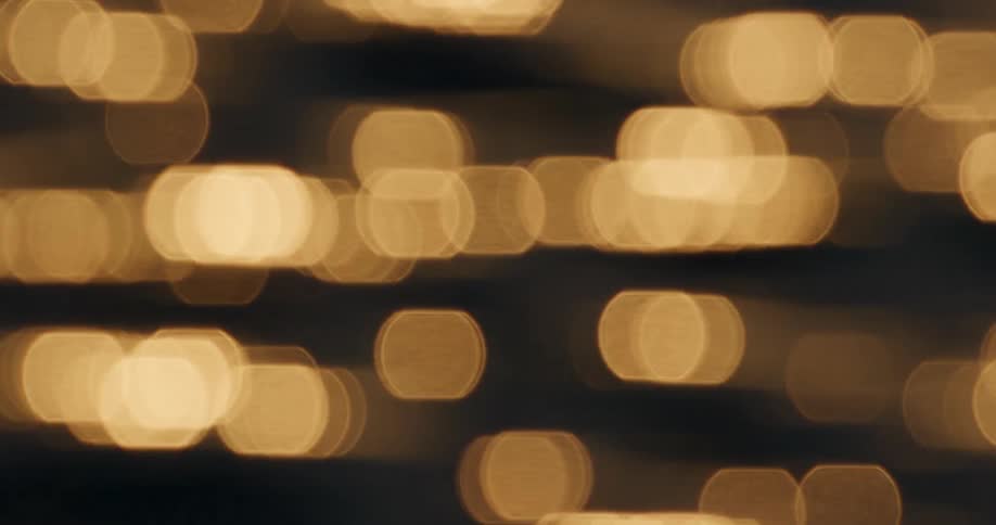 Blurry spots of dim light waving