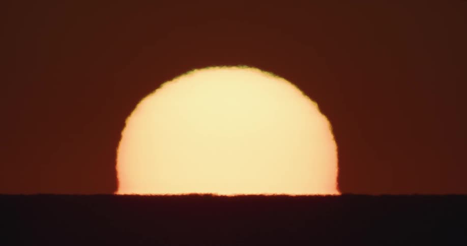 Large and bright sun rises in the sky and provides light and heat for the earth