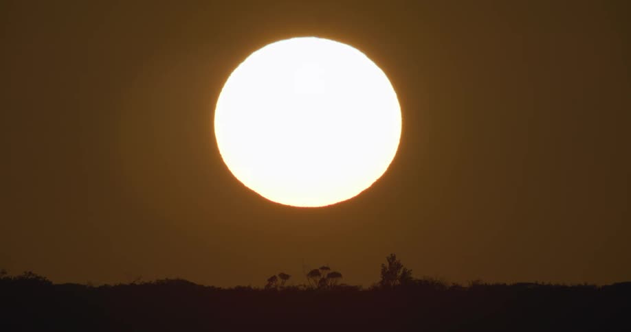 Bright sun shines in the sky during the day and provides light and heat for the earth