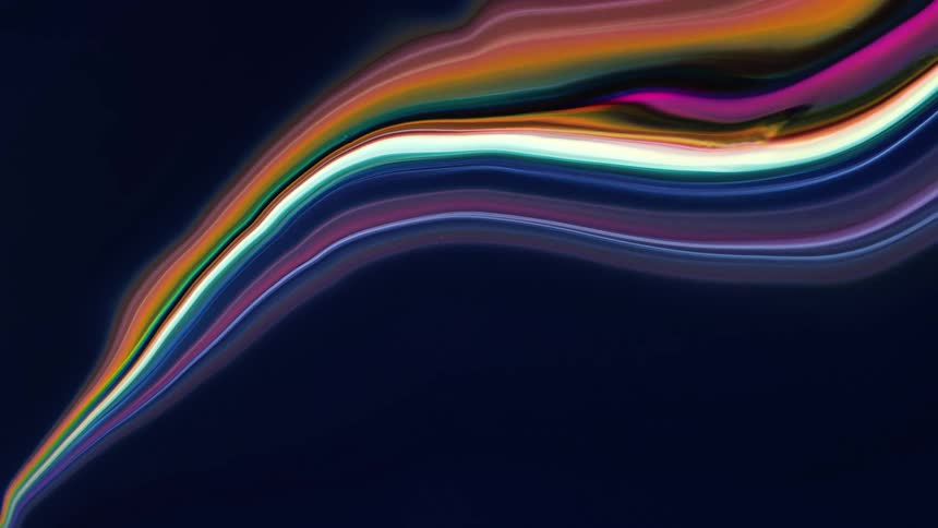 The rainbow of colors swirl around