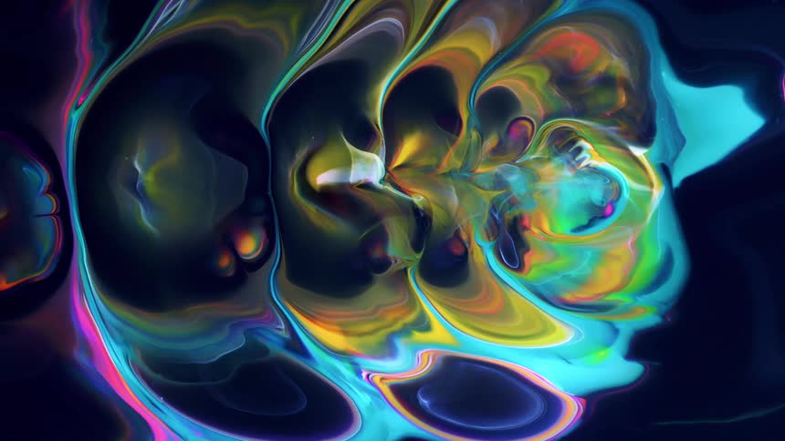 An abstract of bright colors swirling and expanding in turquoise, pink and blue