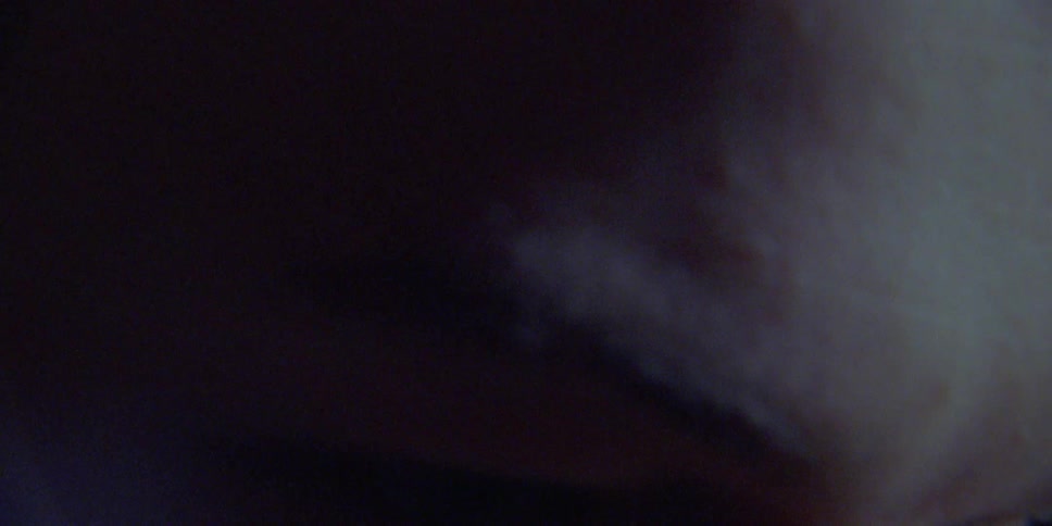 Close up of a man moving his head back and forth