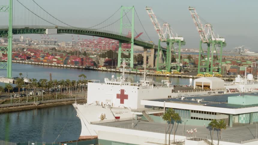 Aerial shot of a shipping dock with a medical boat