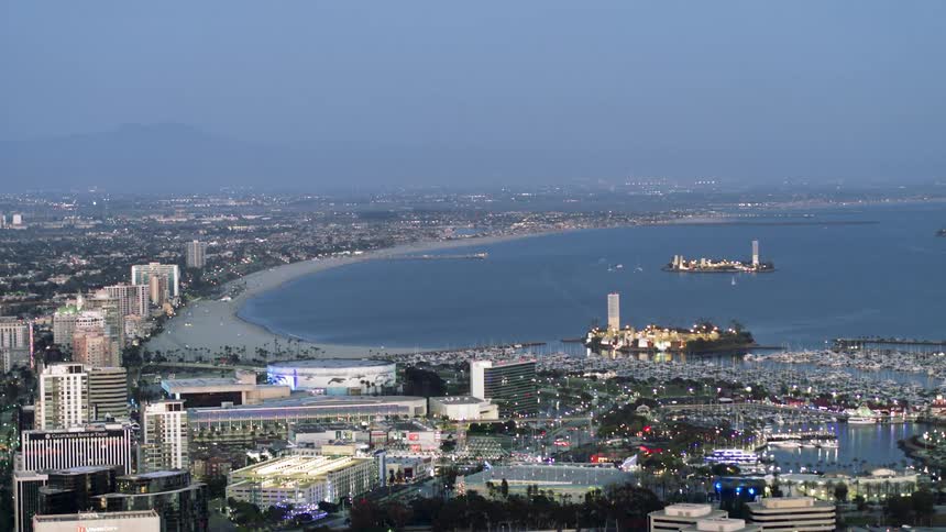A bustling city sits next to the water