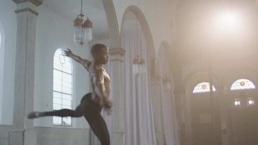 A man is dancing in the hall
