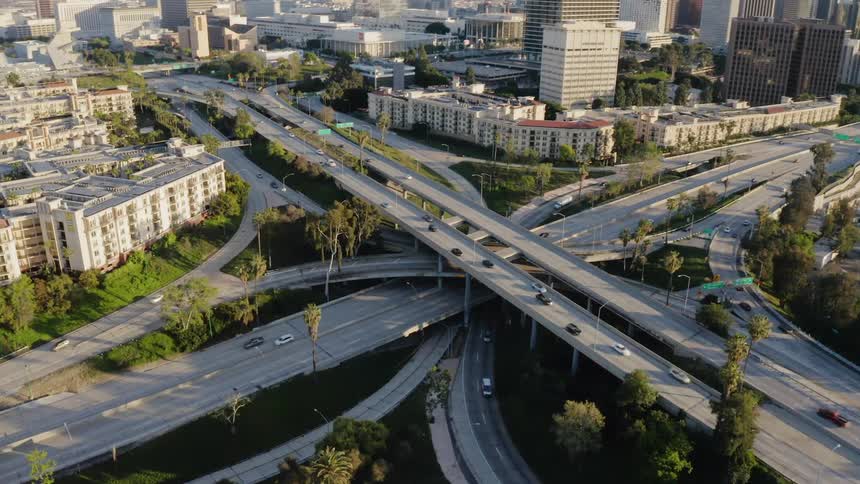Traffic flowing through a highway intersection in Los Angeles