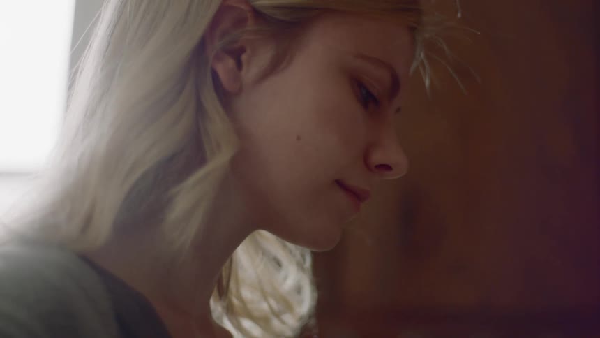 A woman looks down