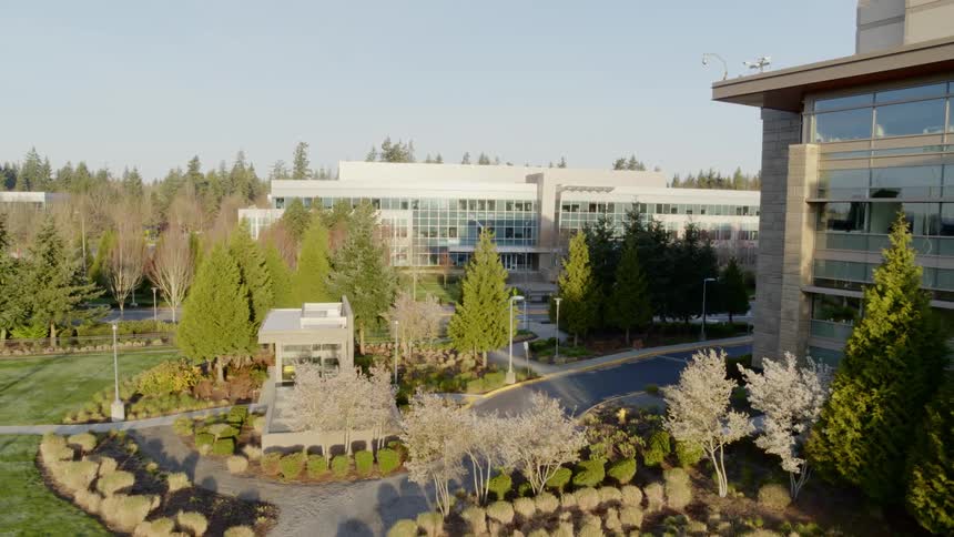 Flying past low rise buildings in an office park
