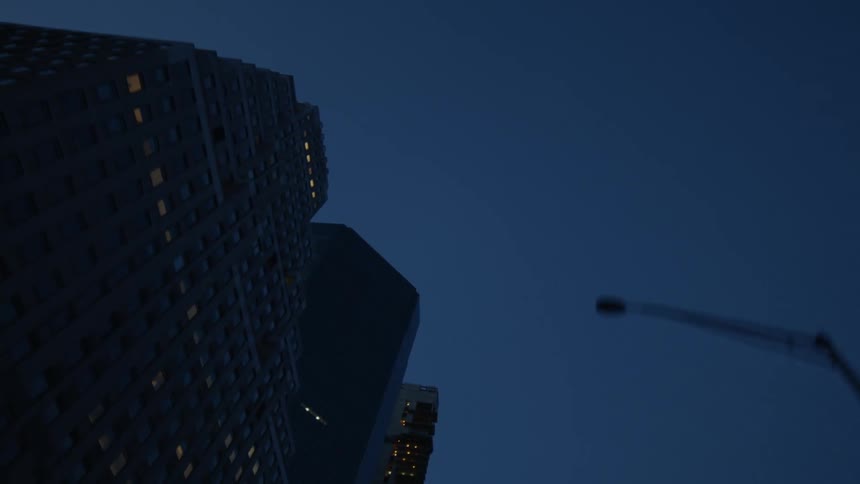 A building in a metropolis at night