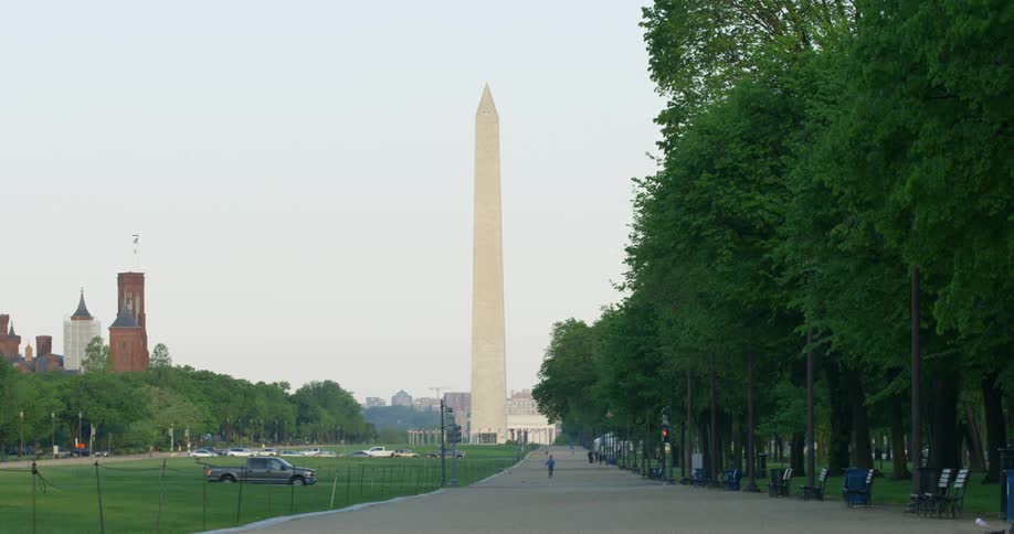 The washington monument stands tall