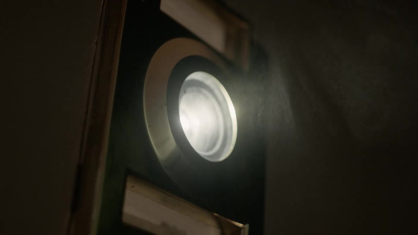 The lens shows the smoke
