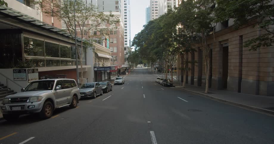 Cars parked on a quiet city street