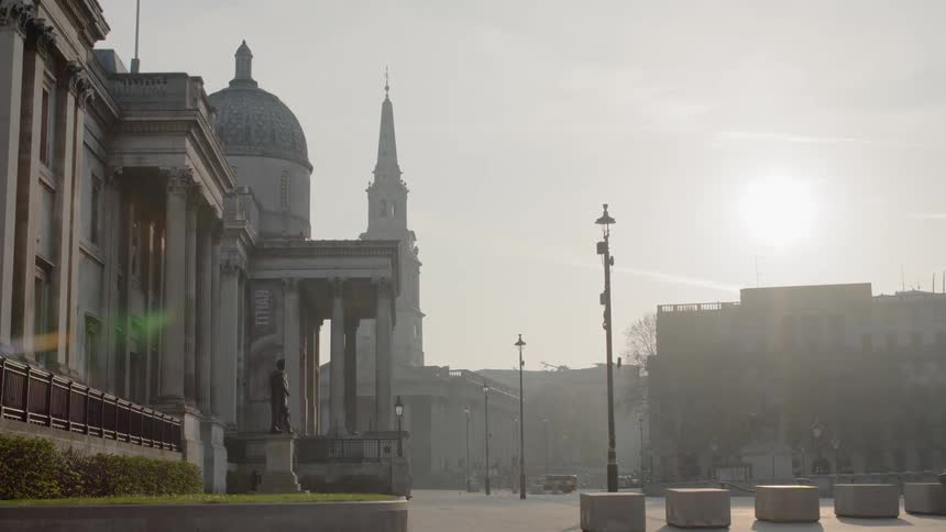 Vehicles pass by st paulscathedral