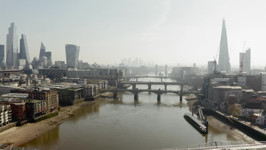 Series of bridges span the river to connect two sides of city