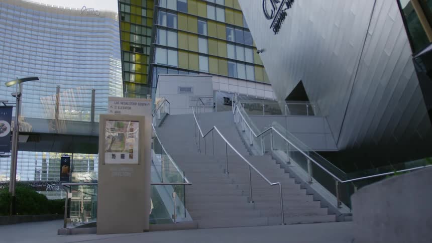 A staircase coming from a building is displayed