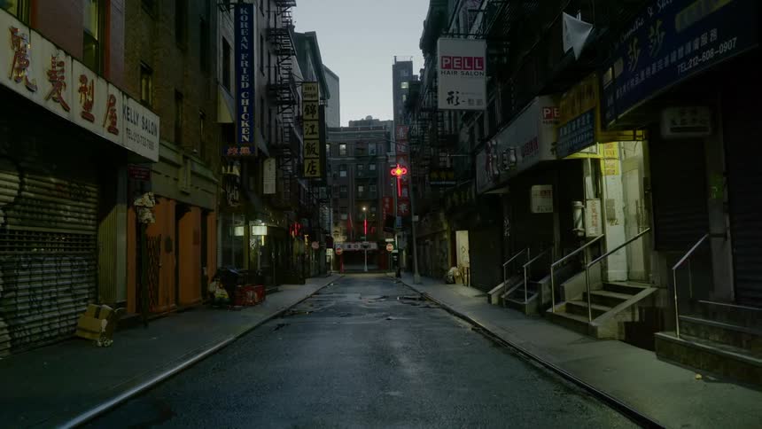 The neighborhood street is empty